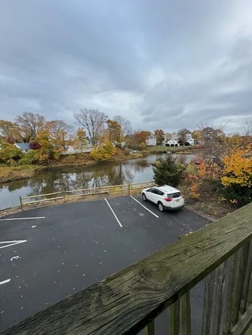 an aerial view of a house with a ocean view