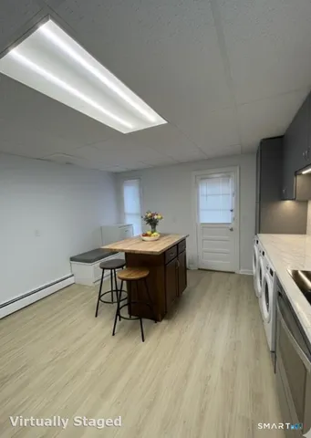 a workspace with furniture and window