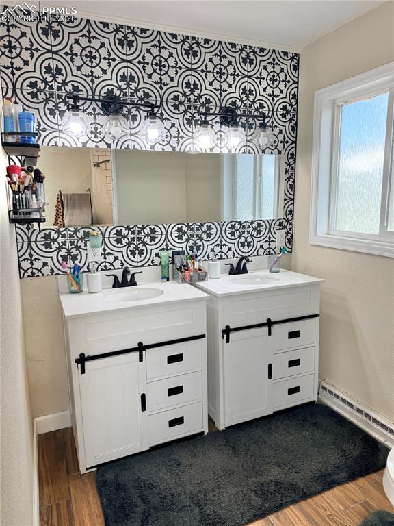 58 Duke Street Pueblo, CO 81005 - Photo 13 of 35 a bathroom with a sink vanity and mirror