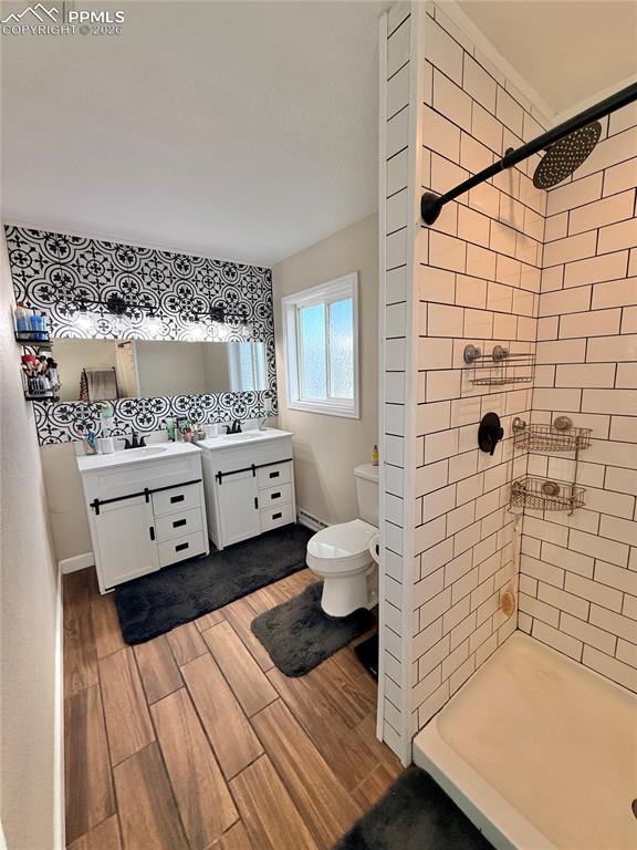 58 Duke Street Pueblo, CO 81005 - Photo 14 of 35 a bathroom with a sink a toilet and shower