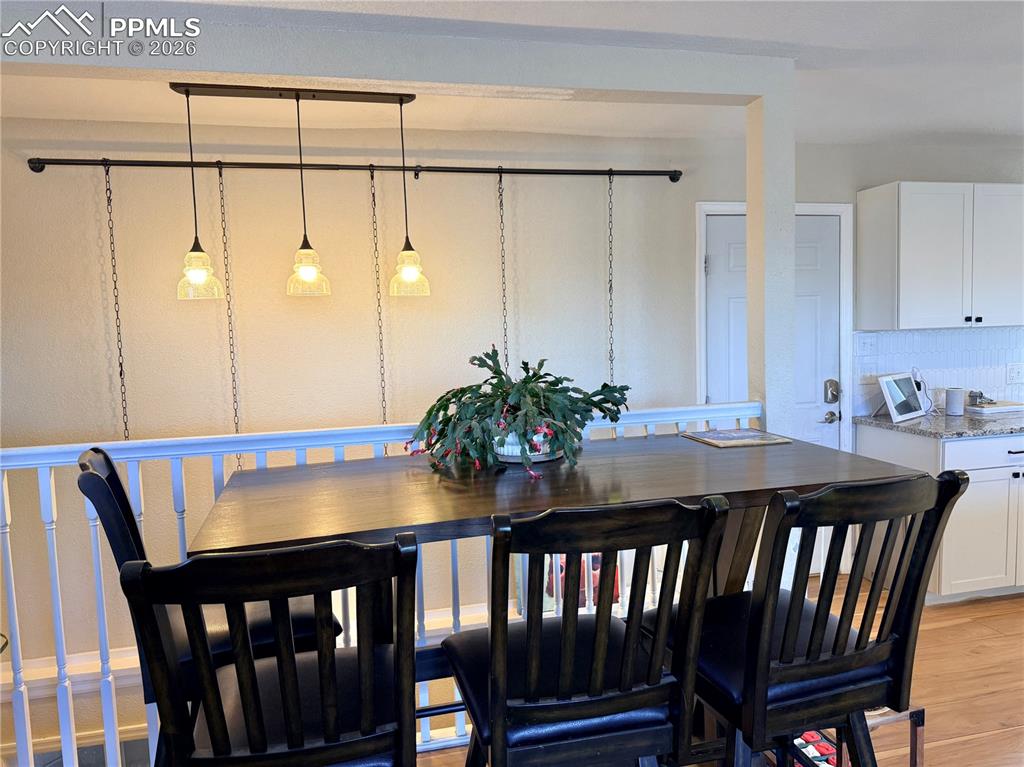 58 Duke Street Pueblo, CO 81005 - Photo 5 of 35 a view of a dining room with furniture