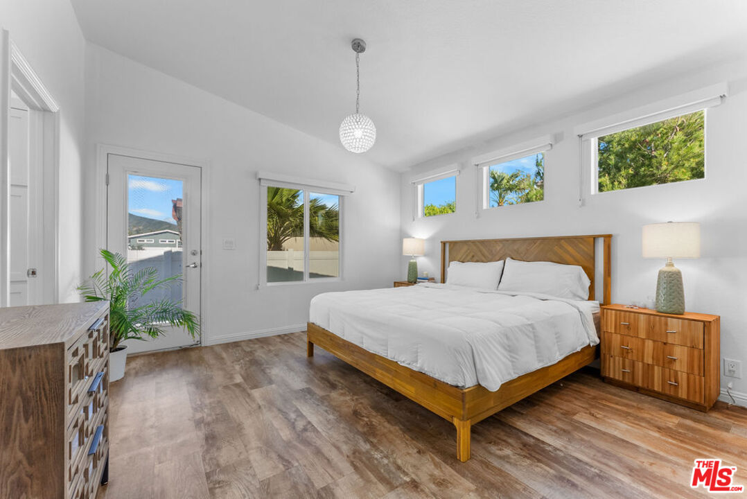 29500 Heathercliff Road, Unit 70 Malibu, CA 90265 - Photo 11 of 38 a bedroom with a bed and window