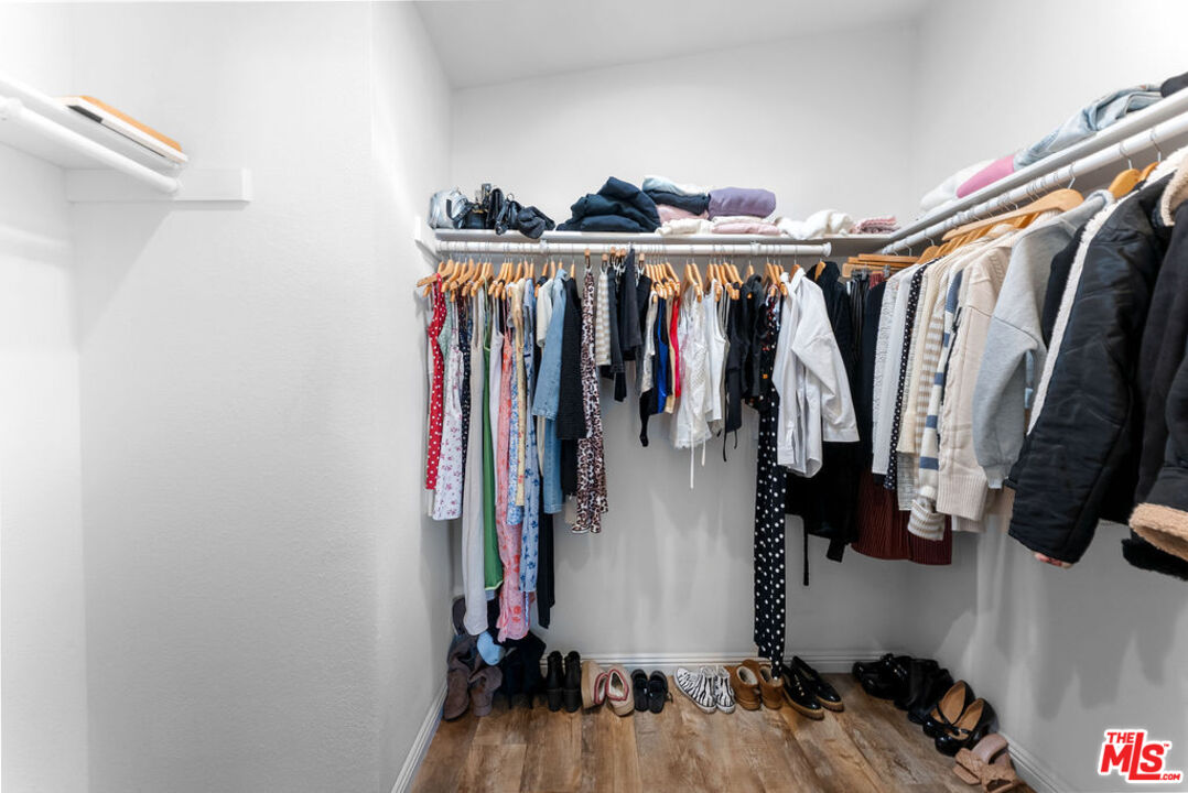 29500 Heathercliff Road, Unit 70 Malibu, CA 90265 - Photo 15 of 38 a view of walk in closet with clothes and shoes