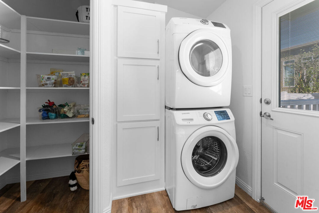29500 Heathercliff Road, Unit 70 Malibu, CA 90265 - Photo 16 of 38 a utility room with dryer and washer