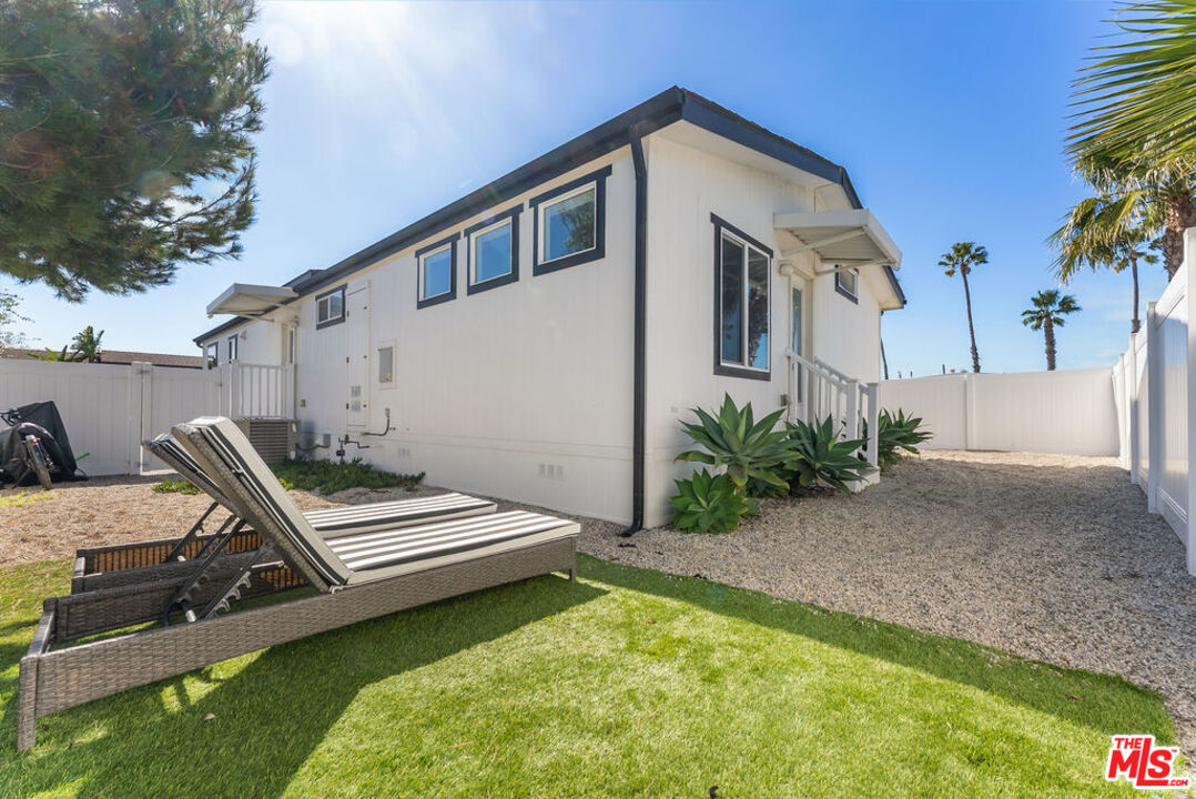 29500 Heathercliff Road, Unit 70 Malibu, CA 90265 - Photo 18 of 38 a front view of a house with garden