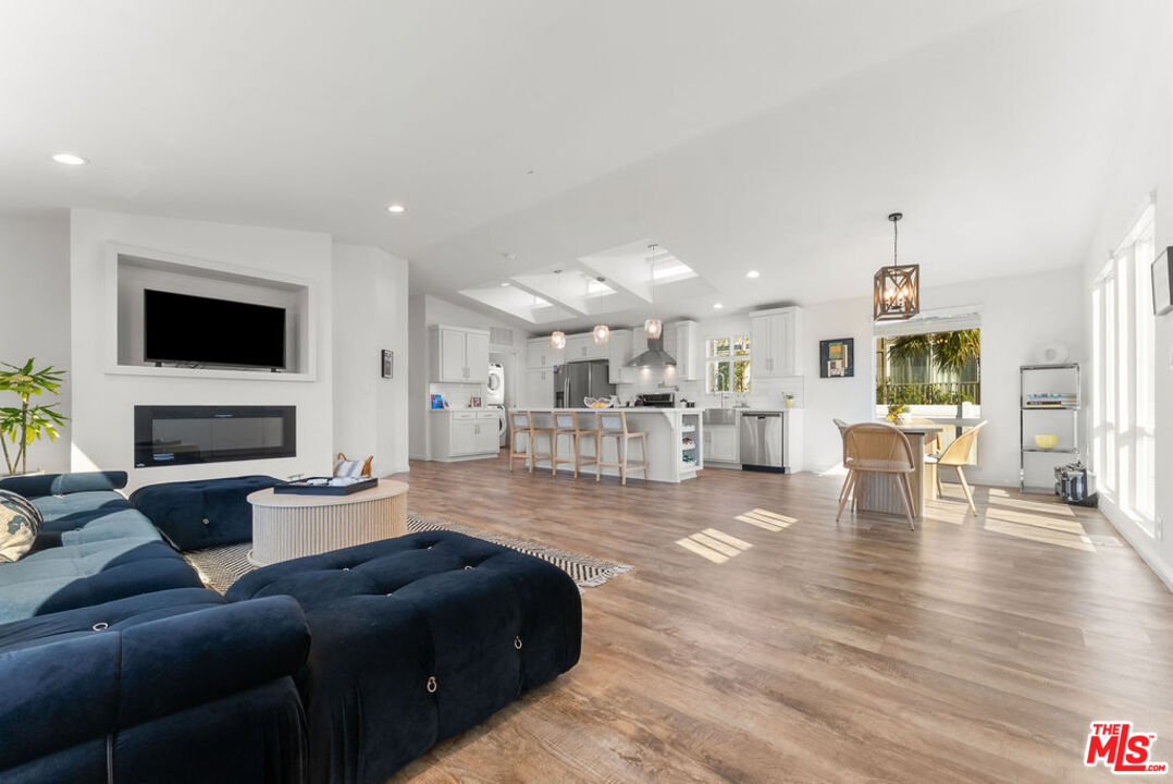 29500 Heathercliff Road, Unit 70 Malibu, CA 90265 - Photo 2 of 38 a living room with furniture and a flat screen tv