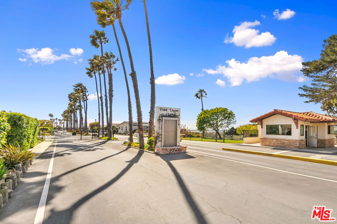 29500 Heathercliff Road, Unit 70 Malibu, CA 90265 - Photo 21 of 38 a view of a terrace with a water fall