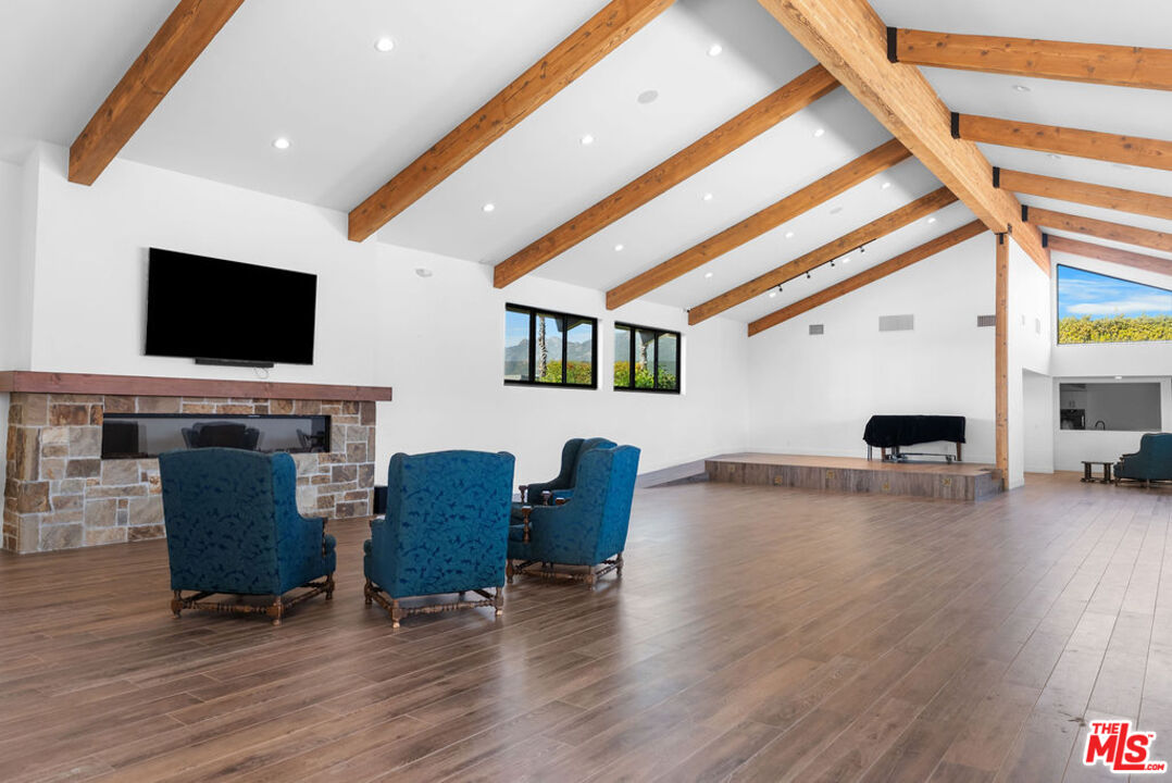 29500 Heathercliff Road, Unit 70 Malibu, CA 90265 - Photo 24 of 38 a living room with furniture and a flat screen tv