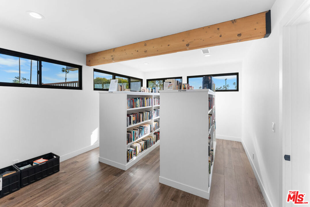 29500 Heathercliff Road, Unit 70 Malibu, CA 90265 - Photo 26 of 38 a view of a hallway with wooden floor and entryway
