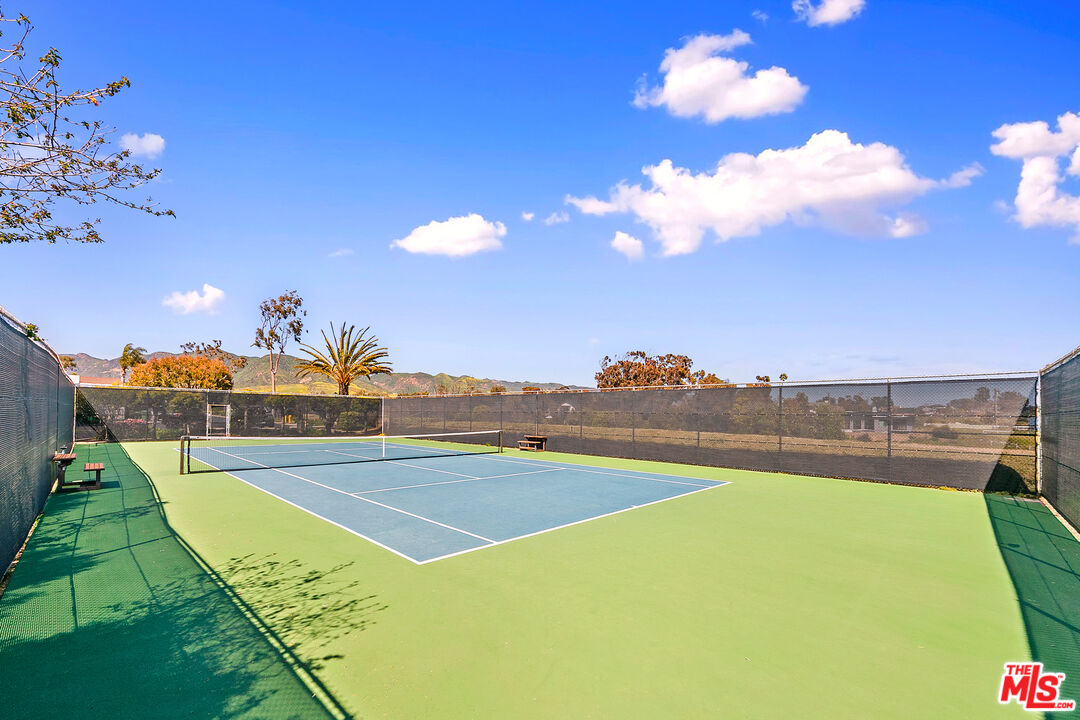 29500 Heathercliff Road, Unit 70 Malibu, CA 90265 - Photo 28 of 38 a view of a swimming pool with an ocean view