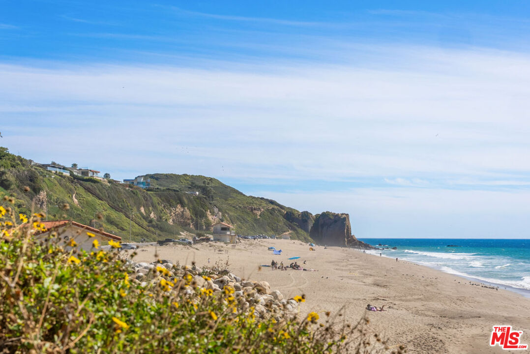 29500 Heathercliff Road, Unit 70 Malibu, CA 90265 - Photo 37 of 38 a view of ocean beach and mountain