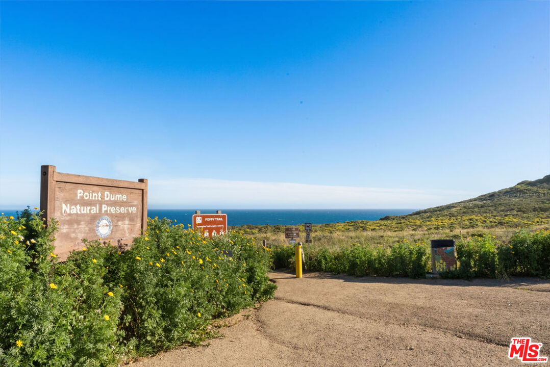 29500 Heathercliff Road, Unit 70 Malibu, CA 90265 - Photo 38 of 38 a view of a pathway both side of house