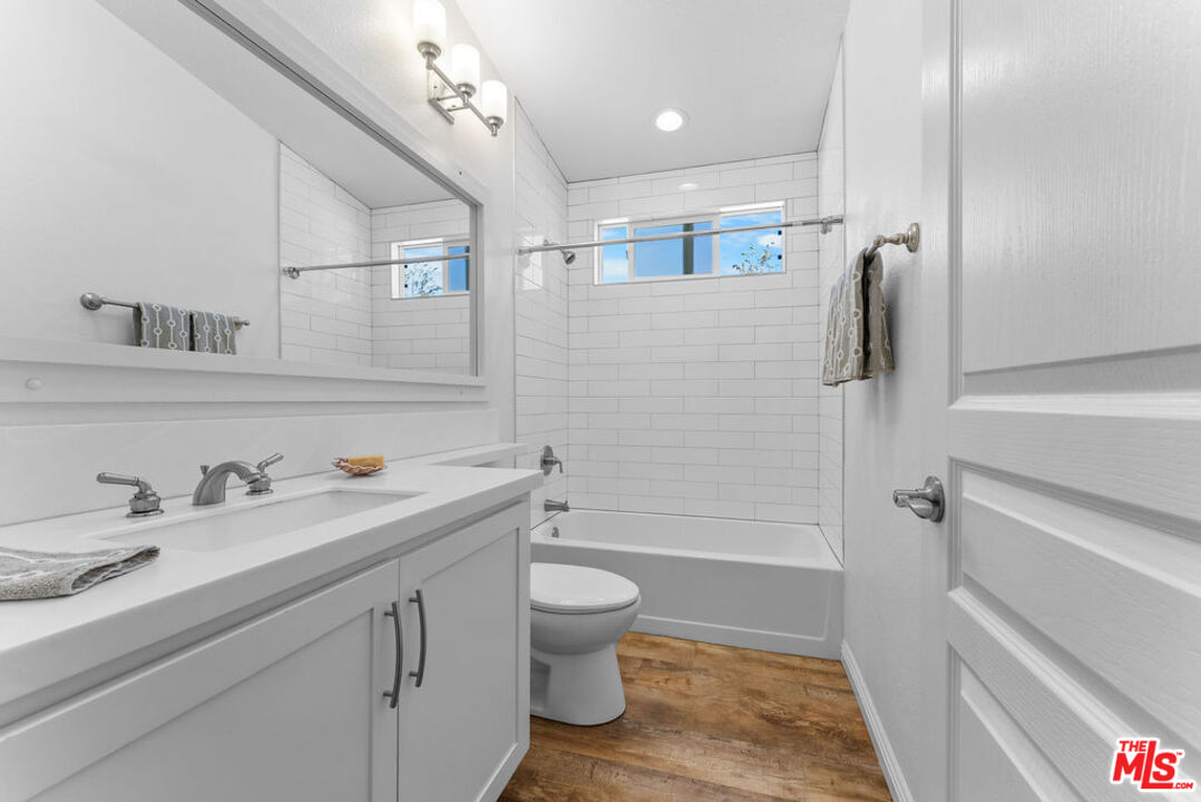 29500 Heathercliff Road, Unit 70 Malibu, CA 90265 - Photo 10 of 38 a bathroom with a sink a toilet and shower