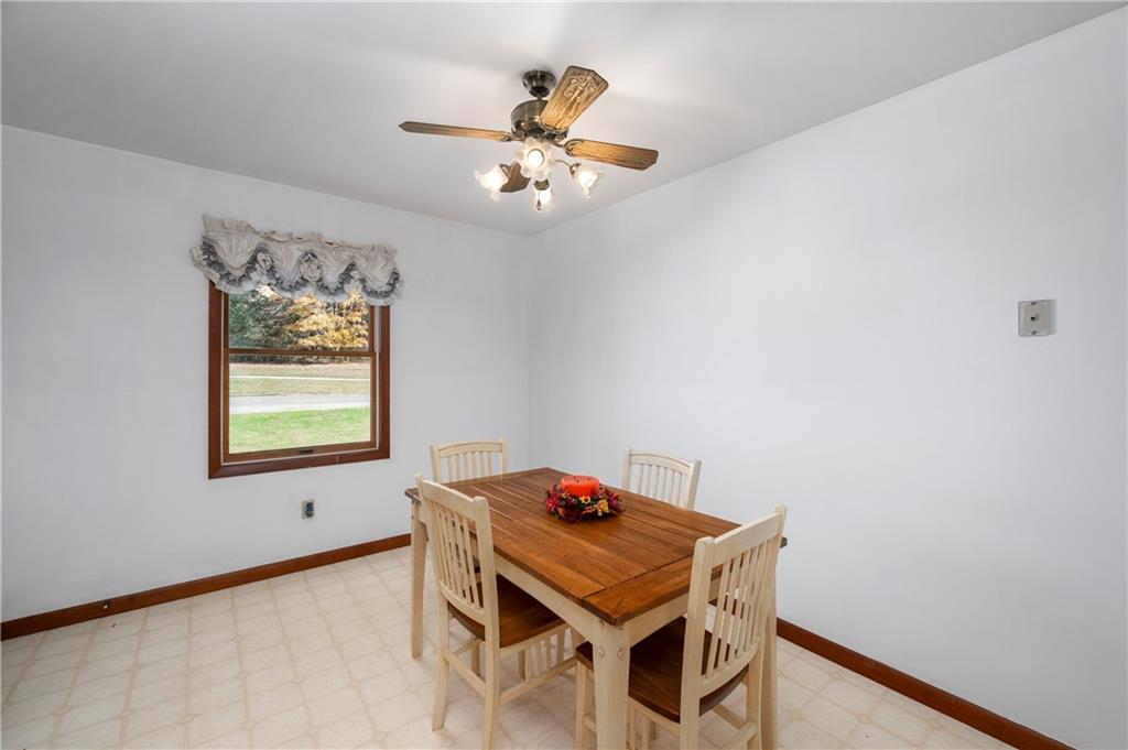 232 Pfeifer Road Harmony, PA 16037 - Photo 14 of 33 a dining room with a table and chairs