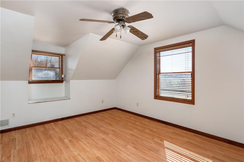 232 Pfeifer Road Harmony, PA 16037 - Photo 20 of 33 a view of empty room with wooden floor and fan