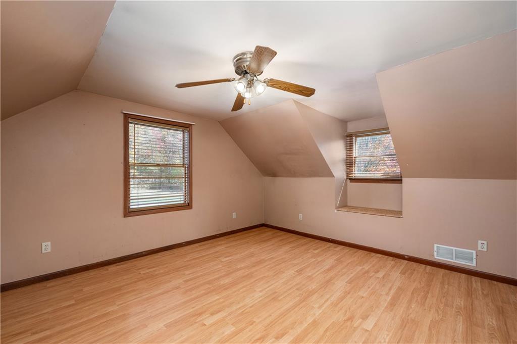 232 Pfeifer Road Harmony, PA 16037 - Photo 23 of 33 a view of empty room with wooden floor and fan