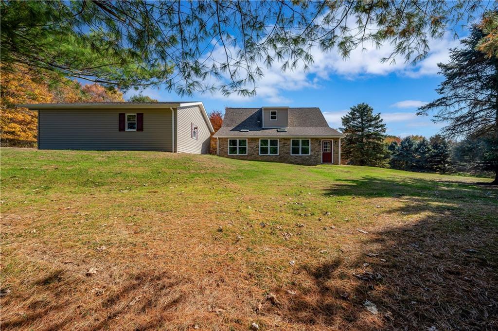 232 Pfeifer Road Harmony, PA 16037 - Photo 29 of 33 a front view of a house with a yard