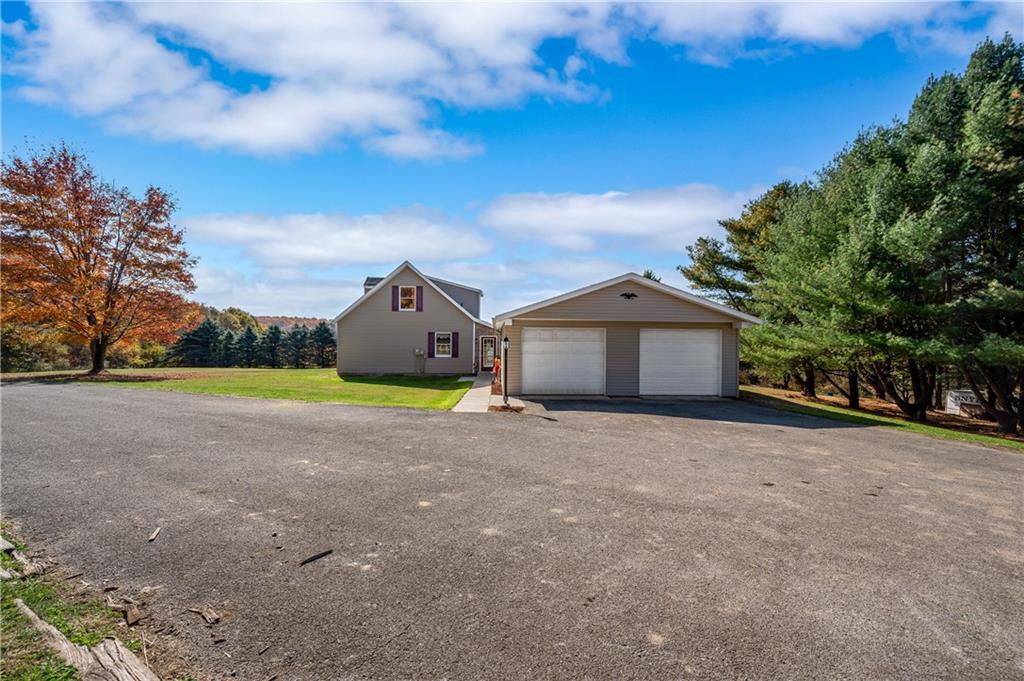232 Pfeifer Road Harmony, PA 16037 - Photo 31 of 33 a view of a house with a yard