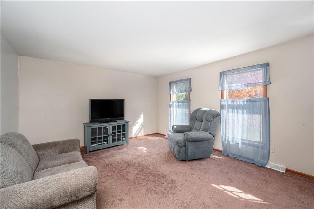 232 Pfeifer Road Harmony, PA 16037 - Photo 7 of 33 a living room with furniture and a flat screen tv