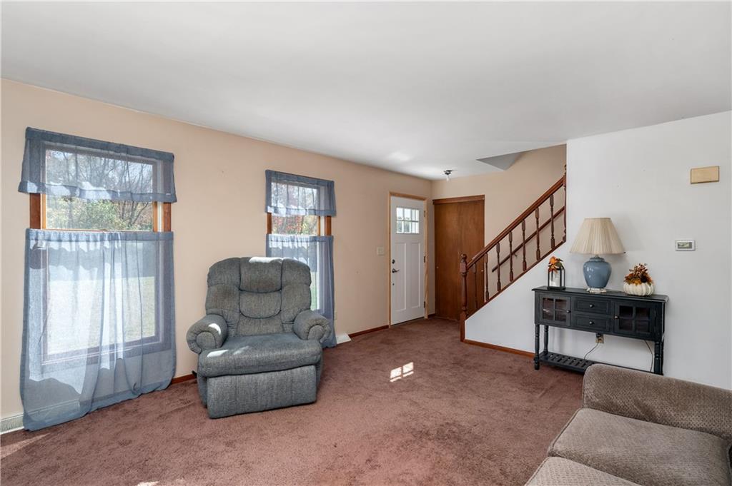 232 Pfeifer Road Harmony, PA 16037 - Photo 8 of 33 a living room with furniture and a window