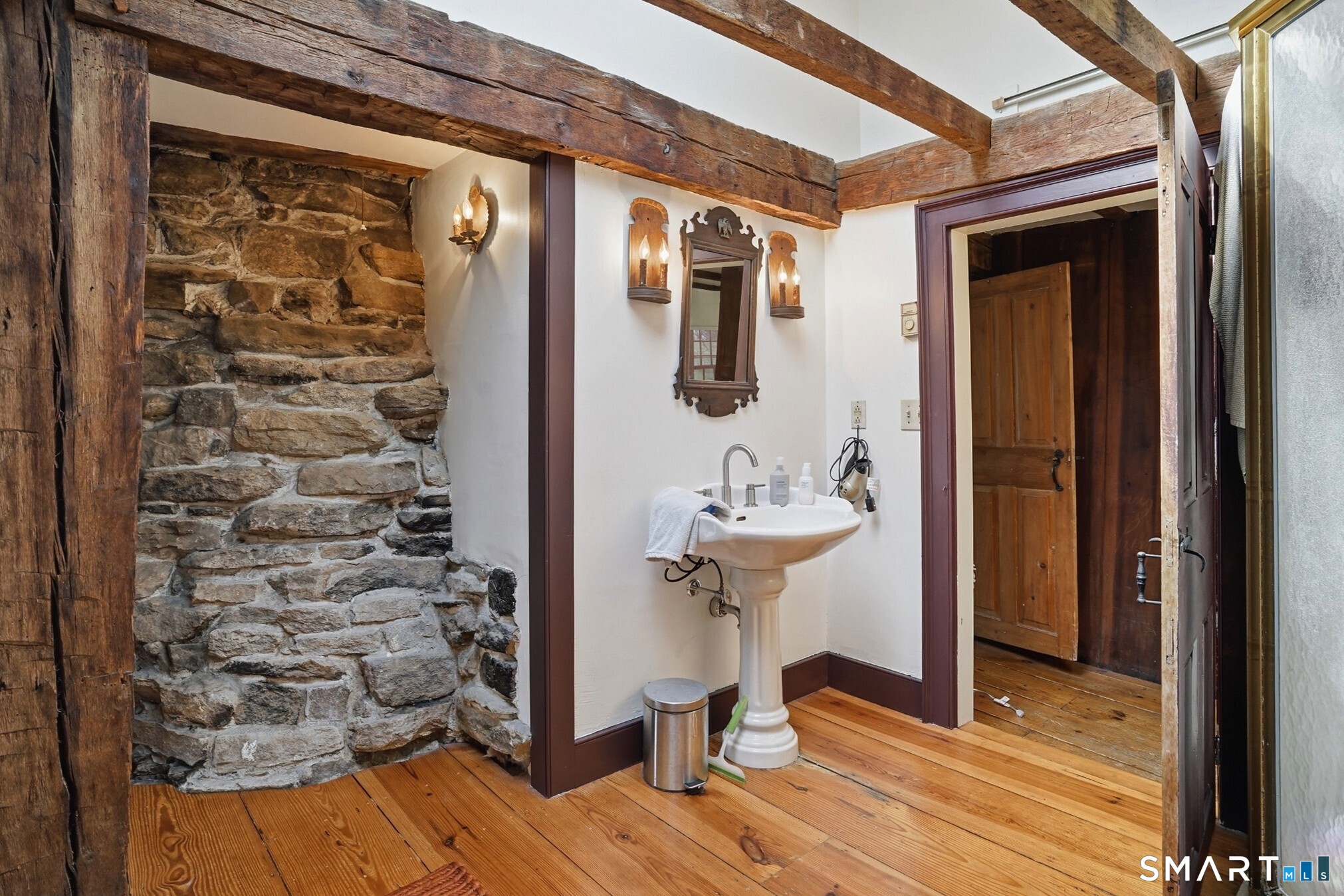 604 Pendleton Hill Road North Stonington, CT 06359 - Photo 31 of 39 a bathroom with a sink and shower