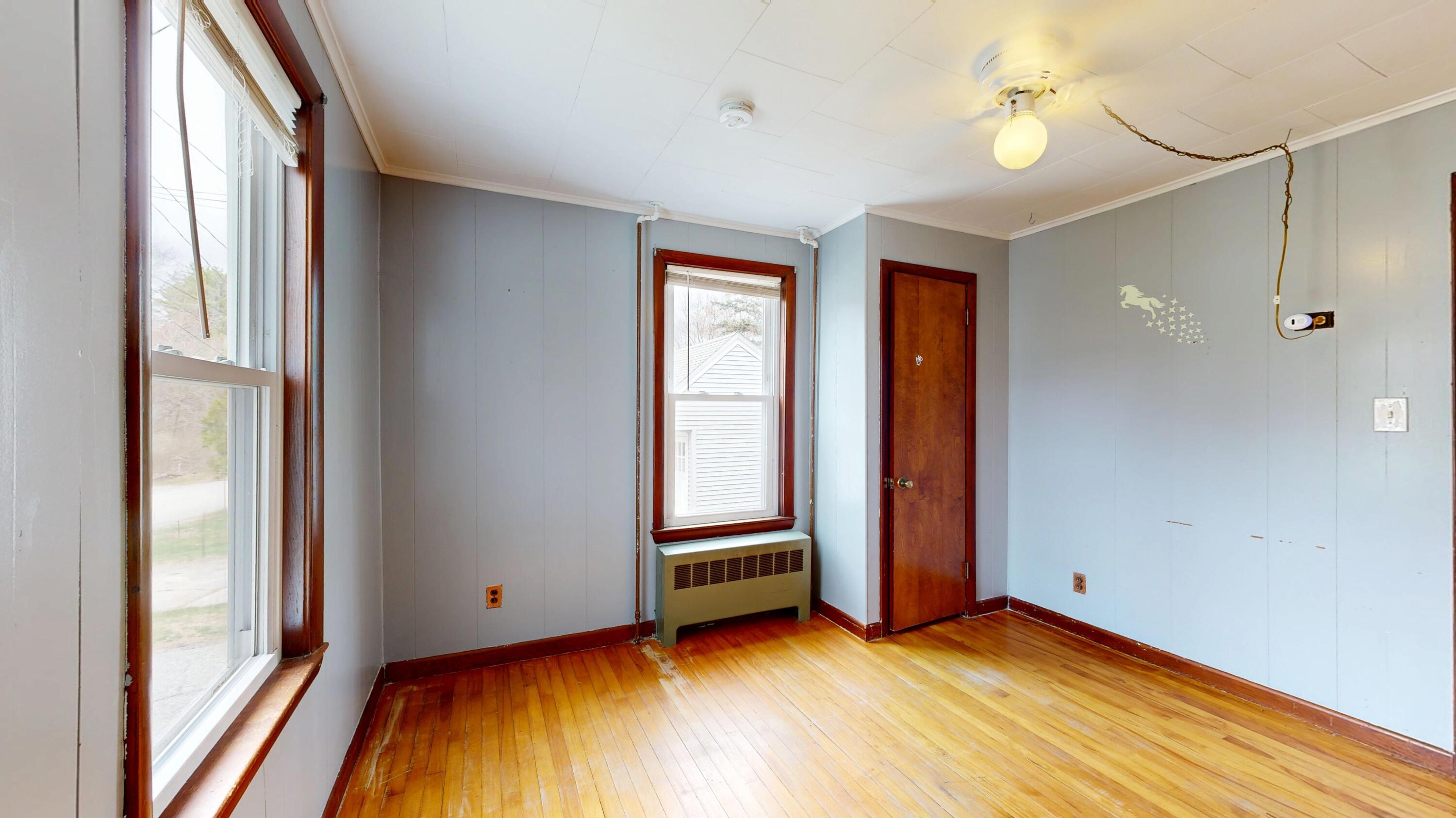 23 Eaton Street Lewiston, ME 04240 - Photo 14 of 40 1st floor bedroom
