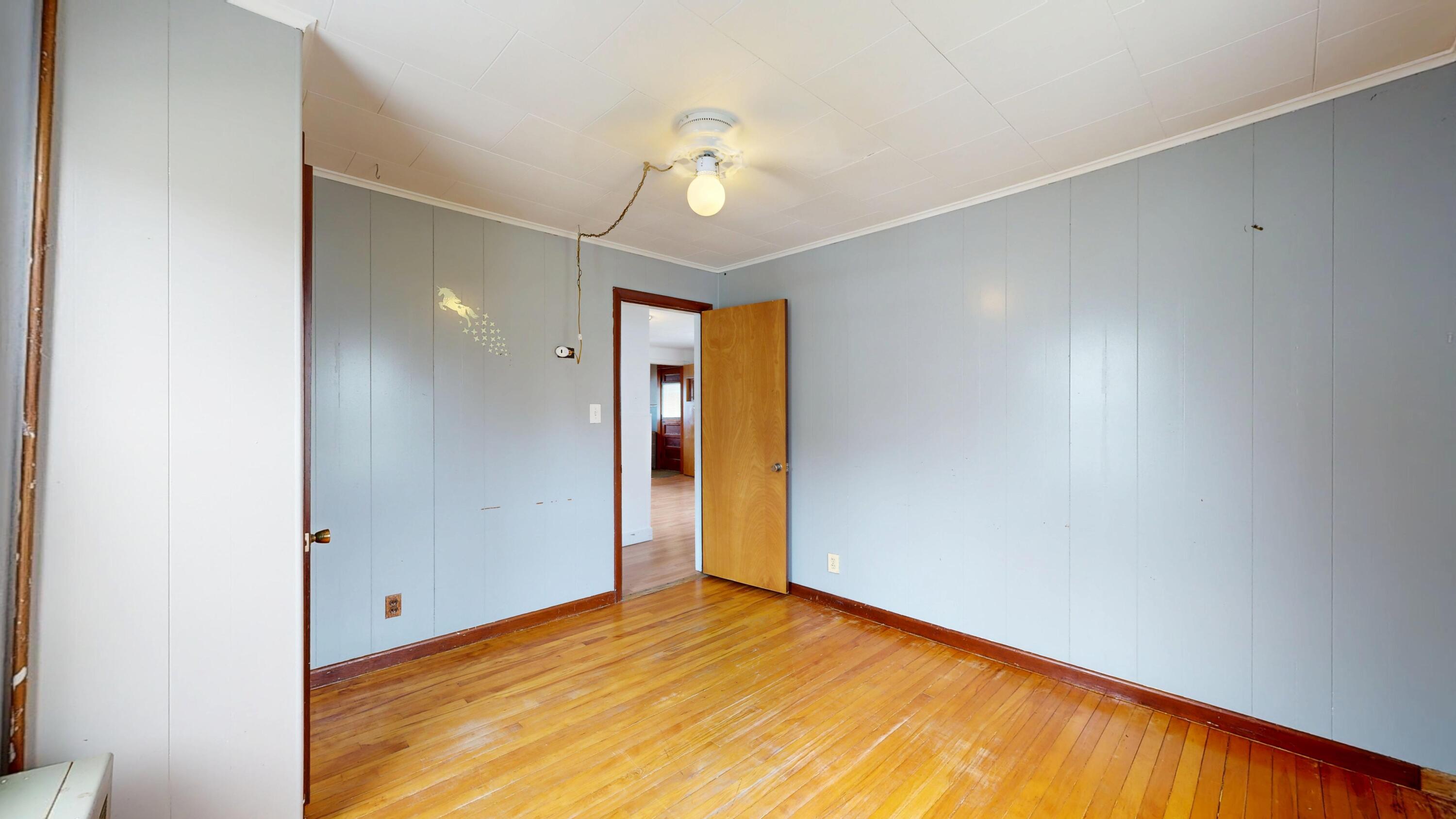 23 Eaton Street Lewiston, ME 04240 - Photo 15 of 40 1st floor bedroom