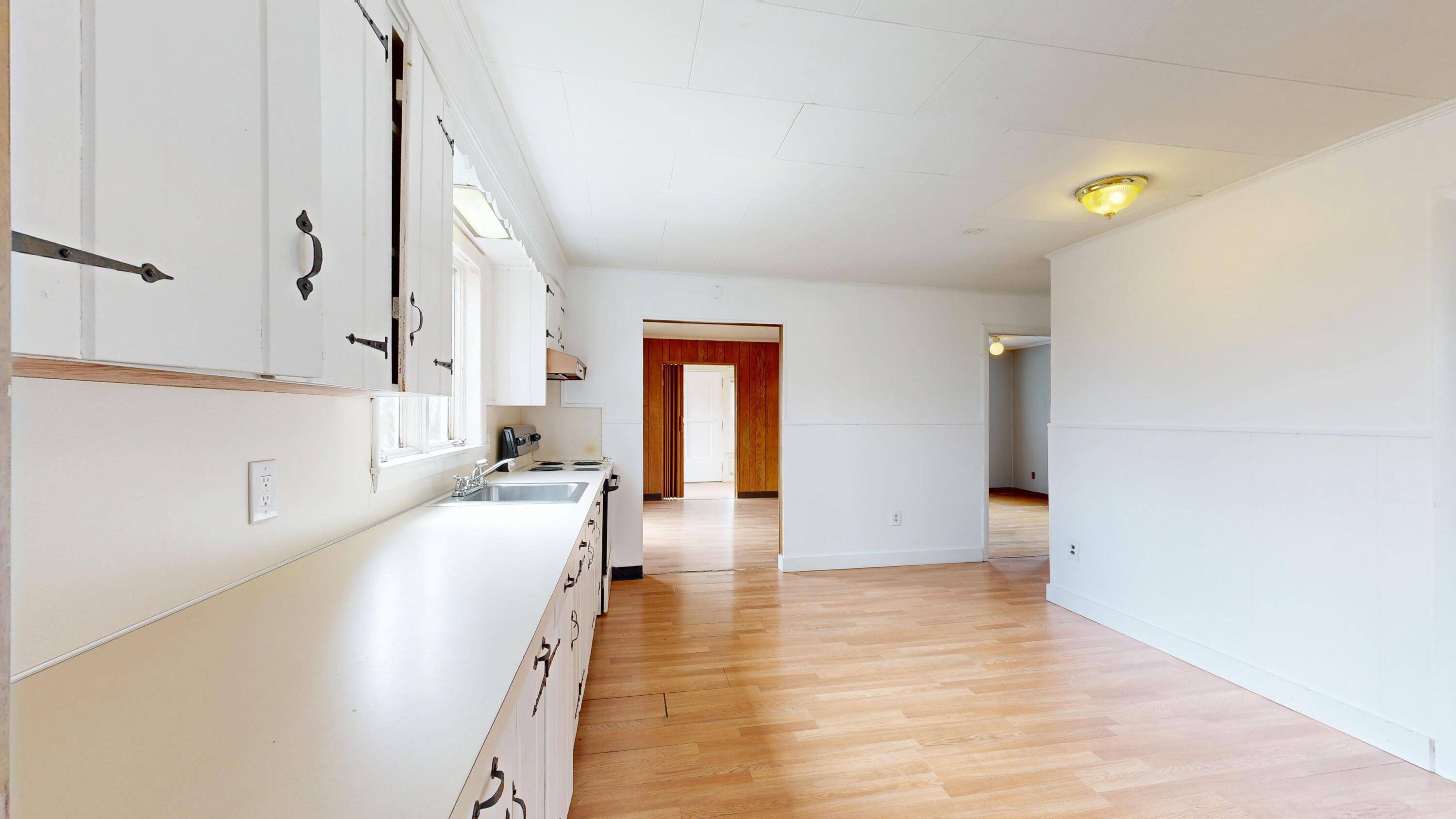 23 Eaton Street Lewiston, ME 04240 - Photo 3 of 40 1st floor kitchen