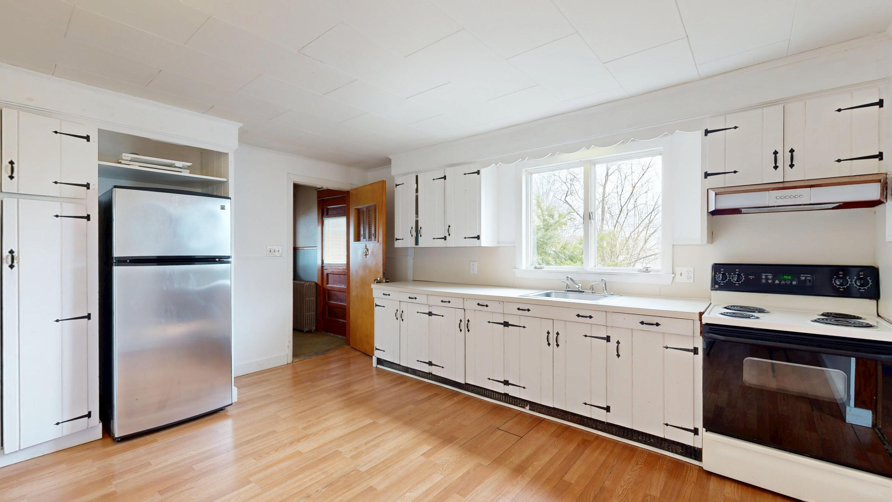 23 Eaton Street Lewiston, ME 04240 - Photo 6 of 40 1st floor kitchen