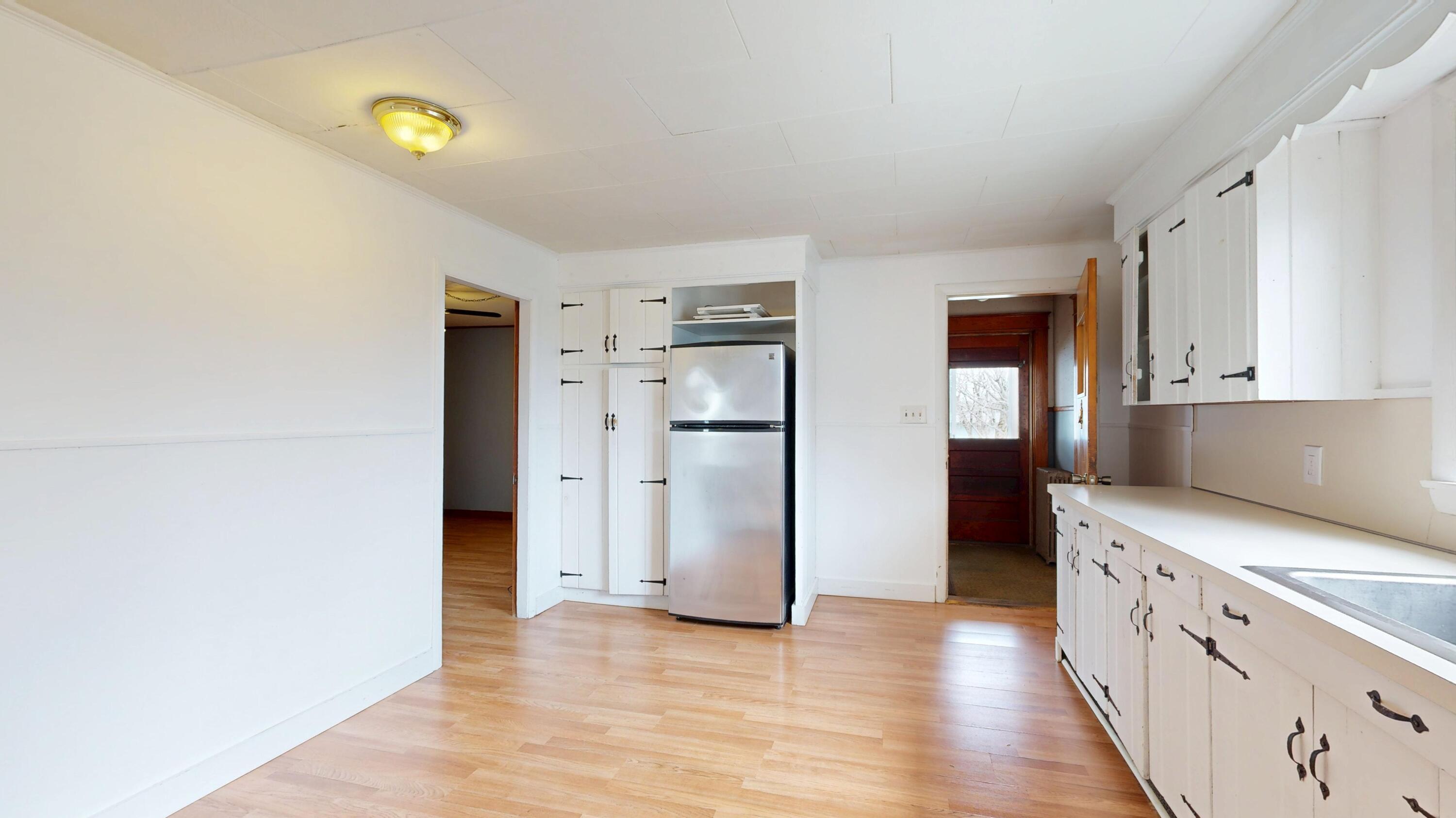 23 Eaton Street Lewiston, ME 04240 - Photo 7 of 40 1st floor kitchen