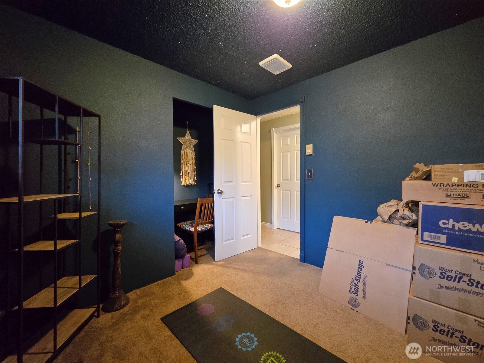 15 Kellogg Road Clallam Bay, WA 98326 - Photo 16 of 27 a bed room with a bed and a television