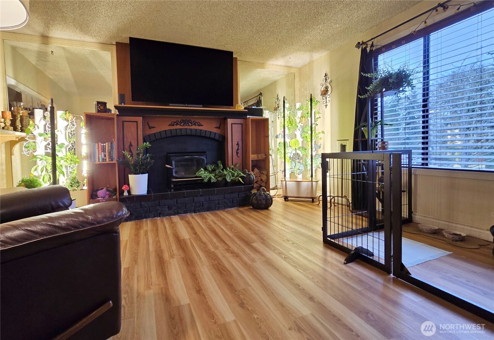 15 Kellogg Road Clallam Bay, WA 98326 - Photo 2 of 27 a living room with furniture and a fireplace