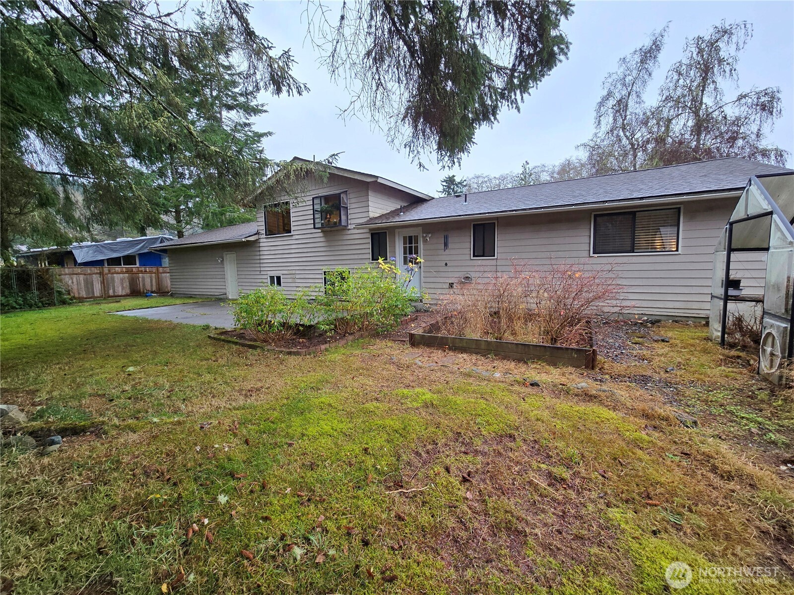 15 Kellogg Road Clallam Bay, WA 98326 - Photo 25 of 27 a front view of a house with garden
