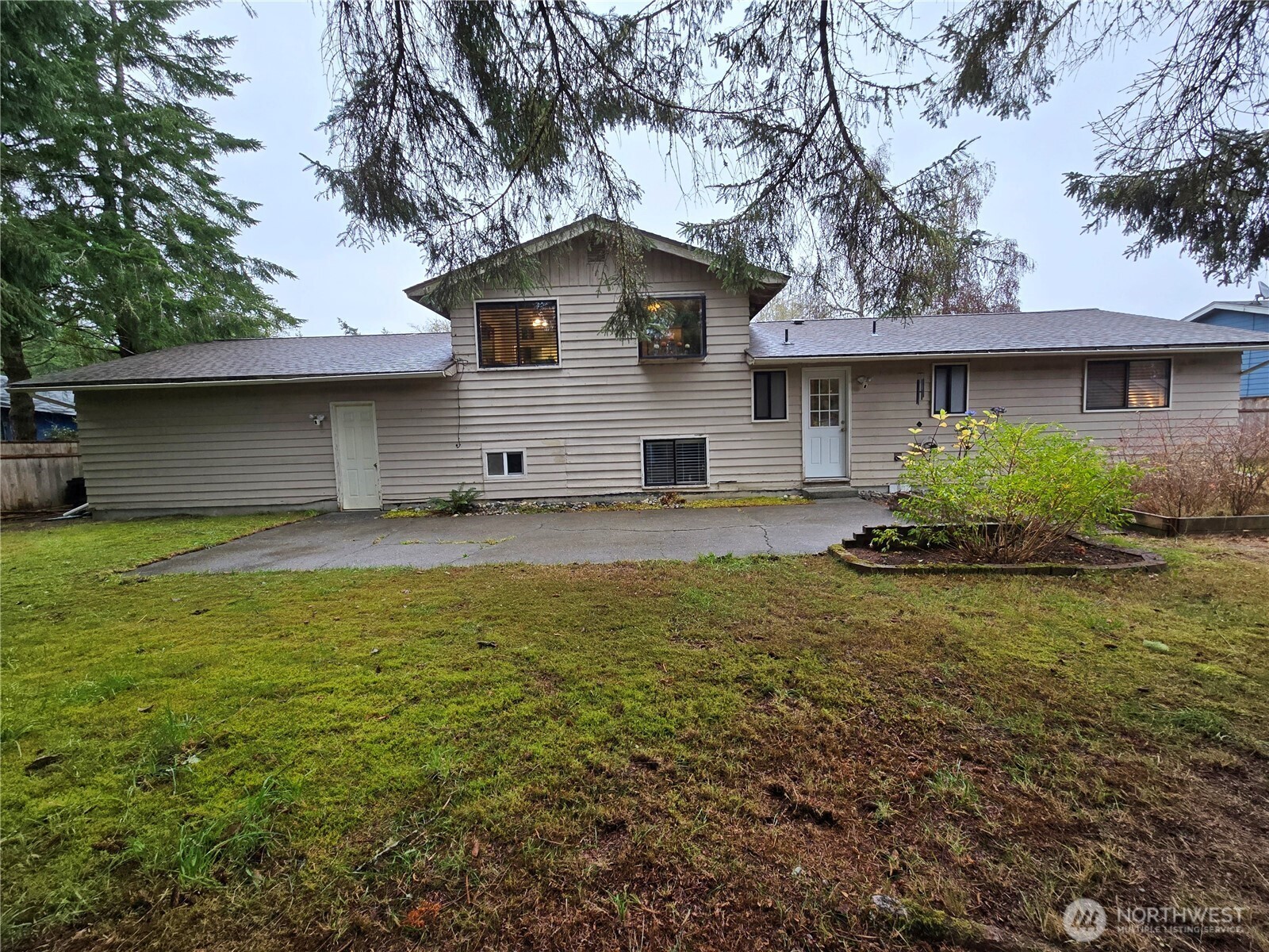 15 Kellogg Road Clallam Bay, WA 98326 - Photo 26 of 27 a front view of a house with garden