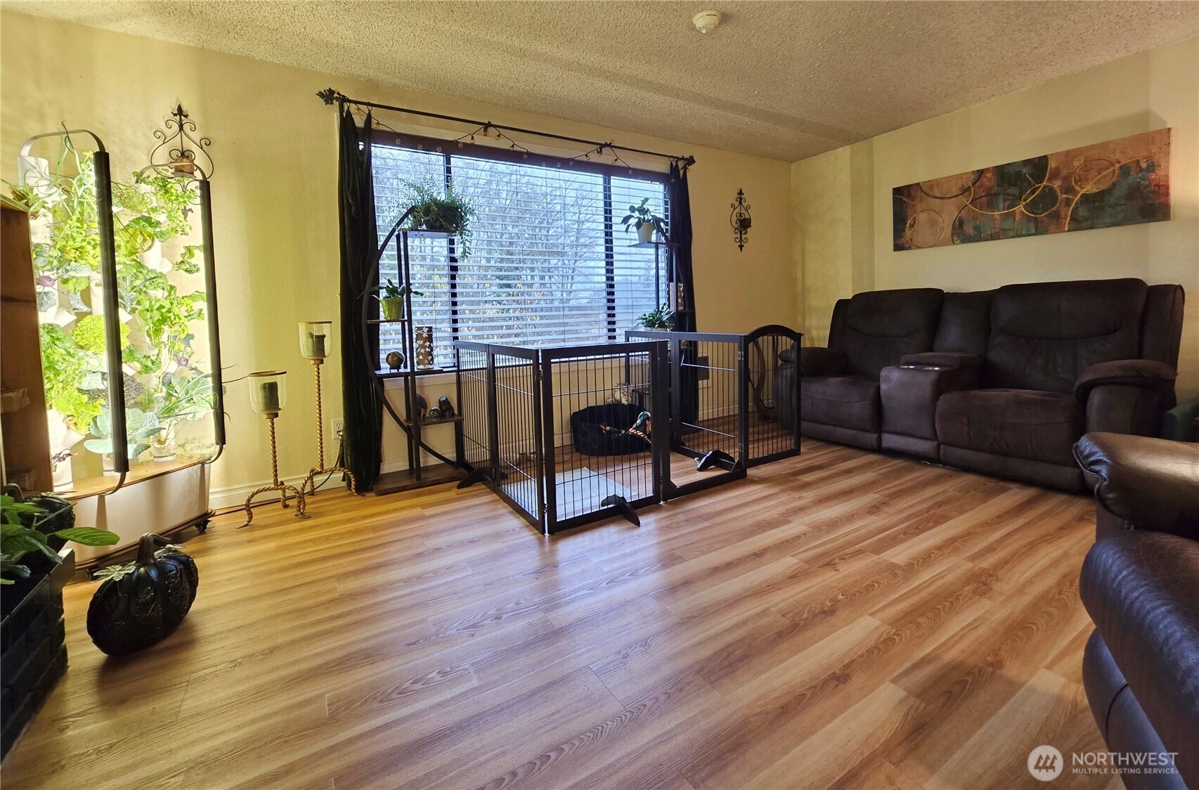15 Kellogg Road Clallam Bay, WA 98326 - Photo 4 of 27 a living room with furniture and a wooden floor
