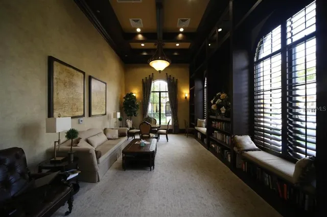 a room with lots of tables and chairs