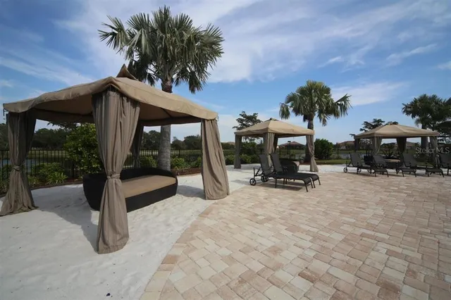 a view of an outdoor space and tennis court
