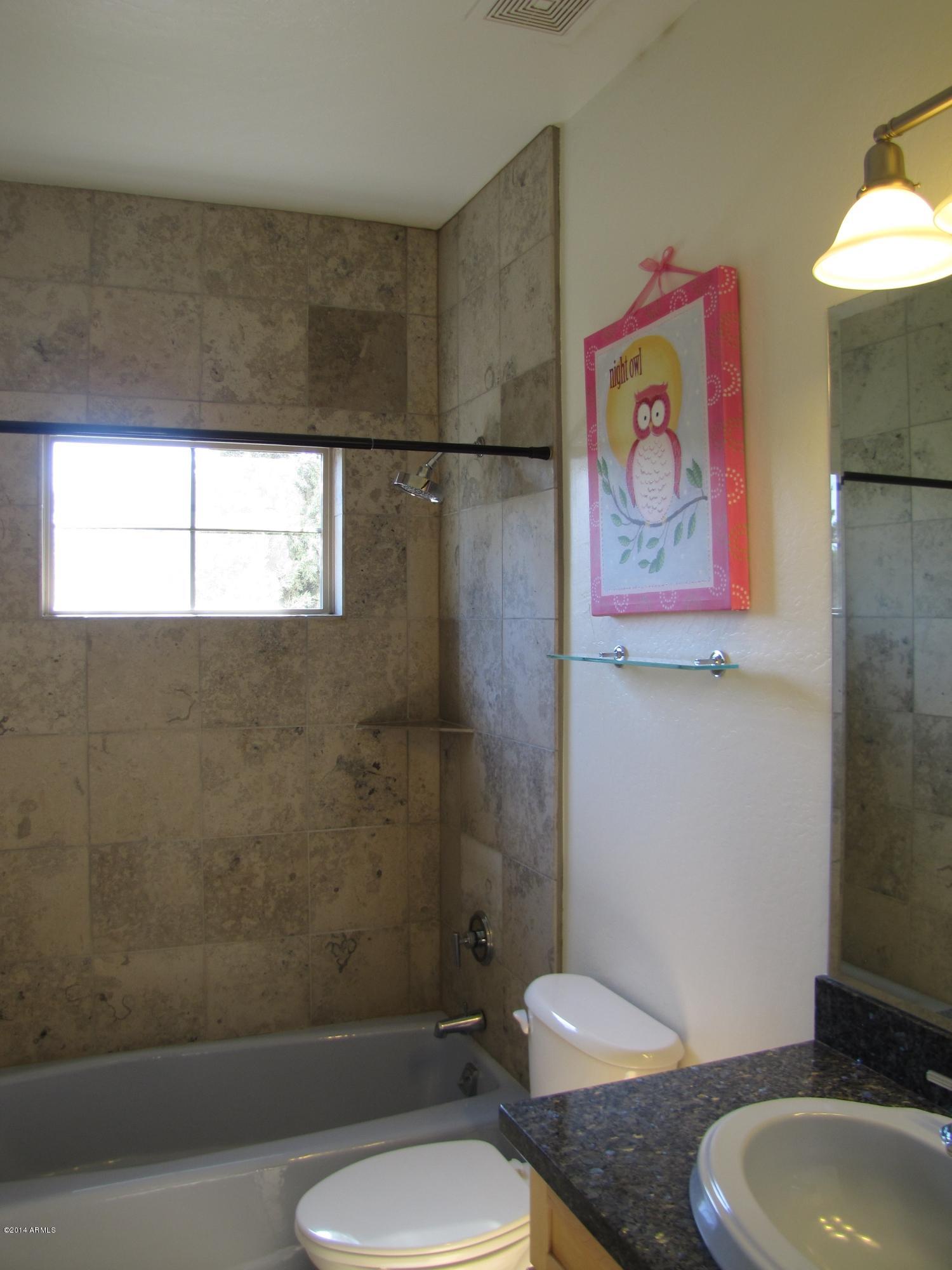 3578 East Redfield Road Gilbert, AZ 85234 - Photo 97 of 127 yellow bathroom