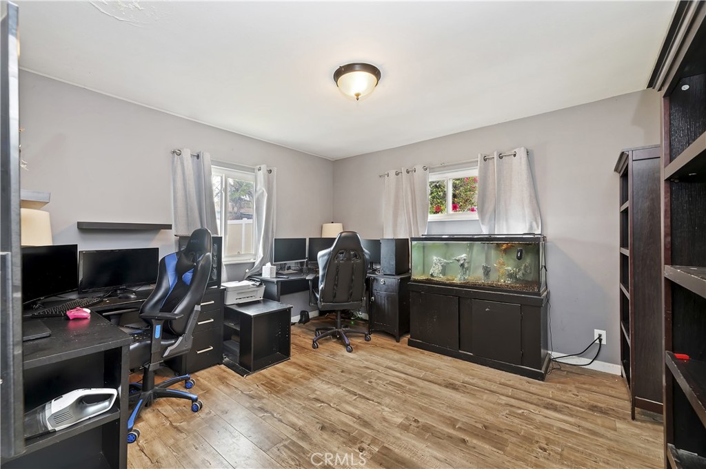 3075 Ronald Street Riverside, CA 92506 - Photo 18 of 30 a bedroom with a workspace