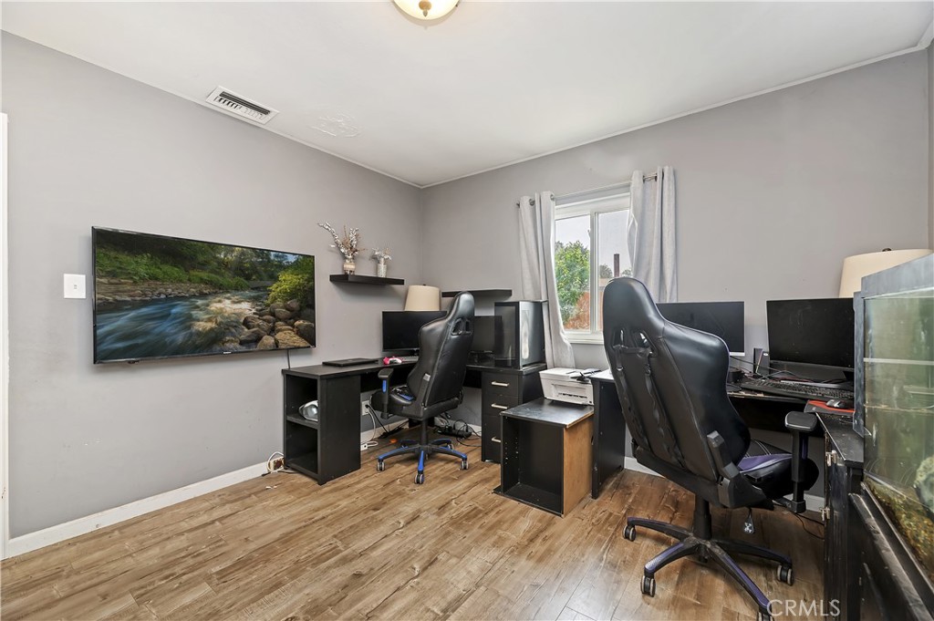 3075 Ronald Street Riverside, CA 92506 - Photo 19 of 30 a view of a workspace with furniture and a window