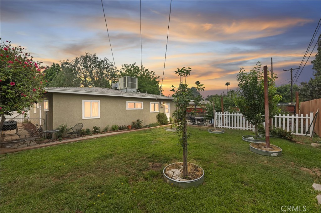 3075 Ronald Street Riverside, CA 92506 - Photo 23 of 30 a front view of a house with a yard