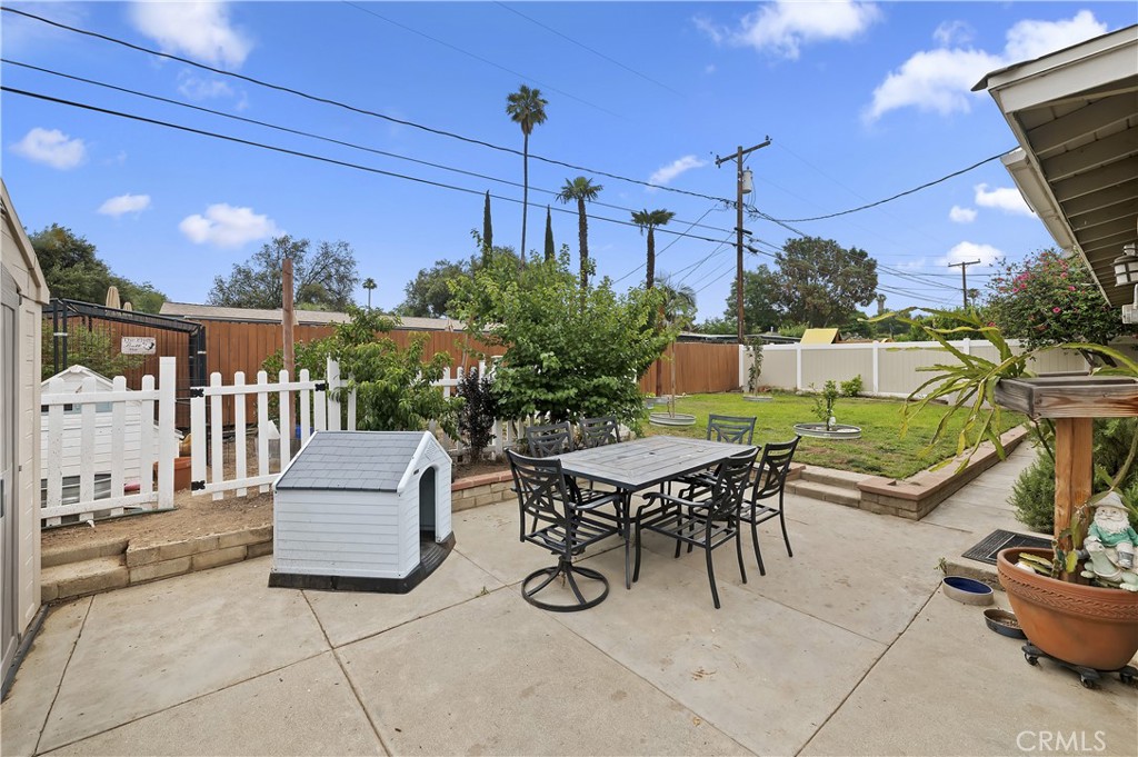 3075 Ronald Street Riverside, CA 92506 - Photo 28 of 30 a view of a patio with a table and chairs