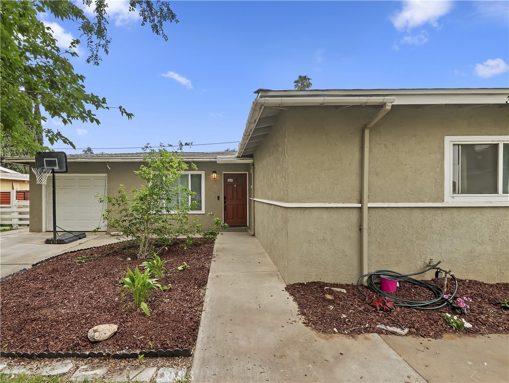 3075 Ronald Street Riverside, CA 92506 - Photo 5 of 30 a view of a backyard with potted plants