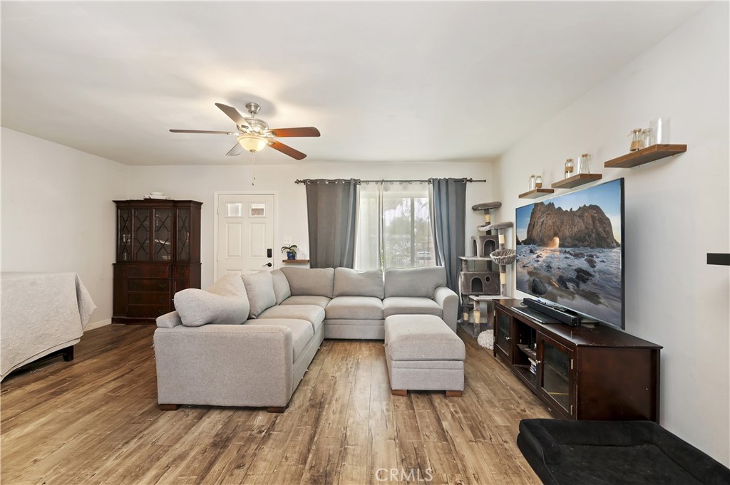 3075 Ronald Street Riverside, CA 92506 - Photo 8 of 30 a living room with furniture and a large window