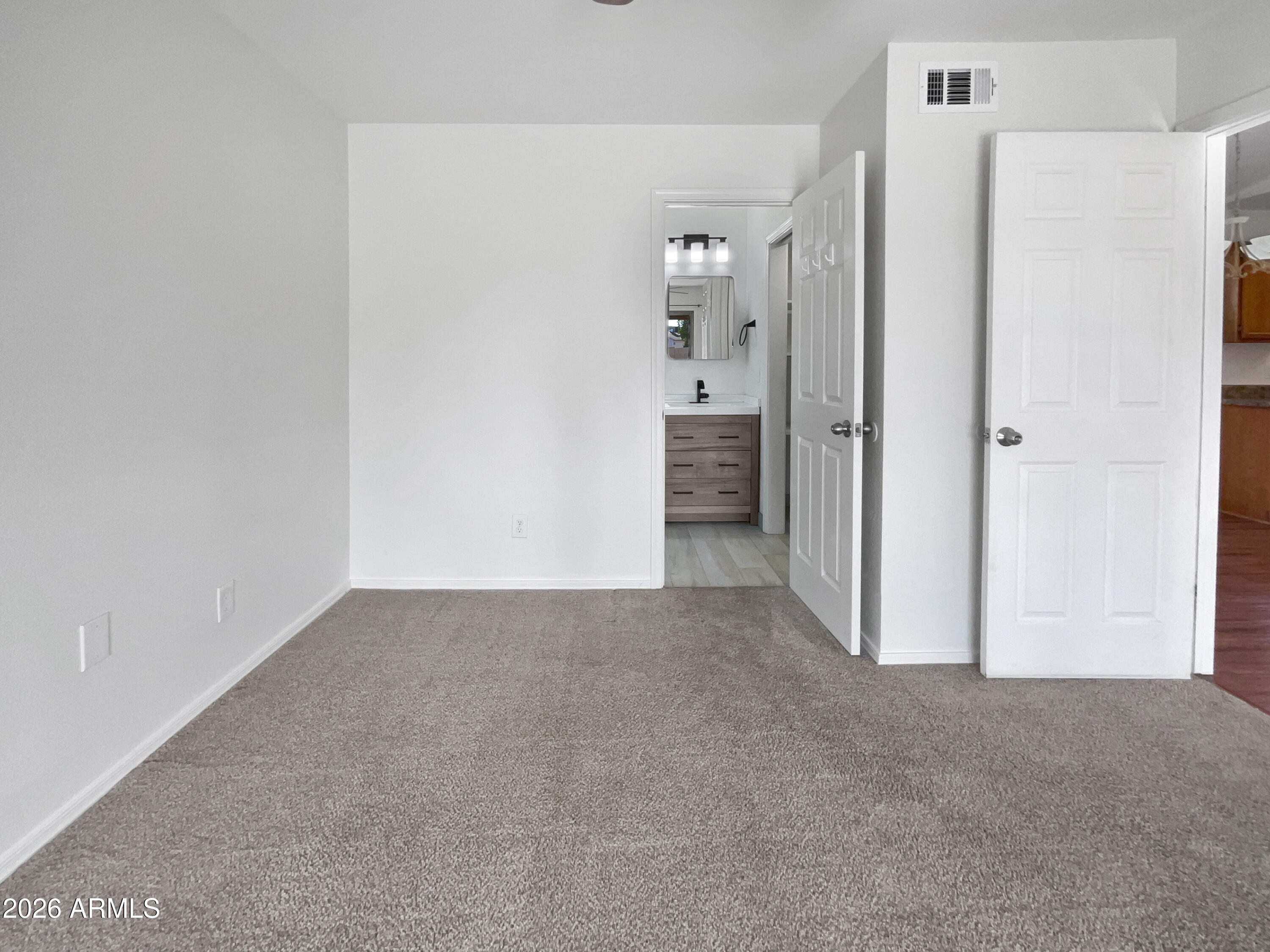 19002 North 14th Place Phoenix, AZ 85024 - Photo 17 of 27 a view of an empty room