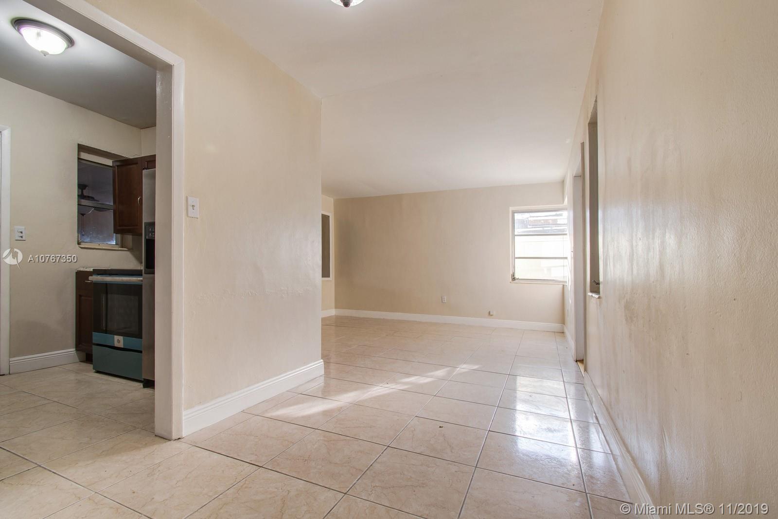 540 Northwest 119th Street Miami, FL 33168 - Photo 2 of 10 Combined dinning & living room