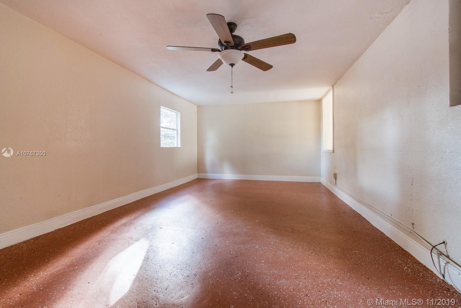 540 Northwest 119th Street Miami, FL 33168 - Photo 5 of 10 Family room