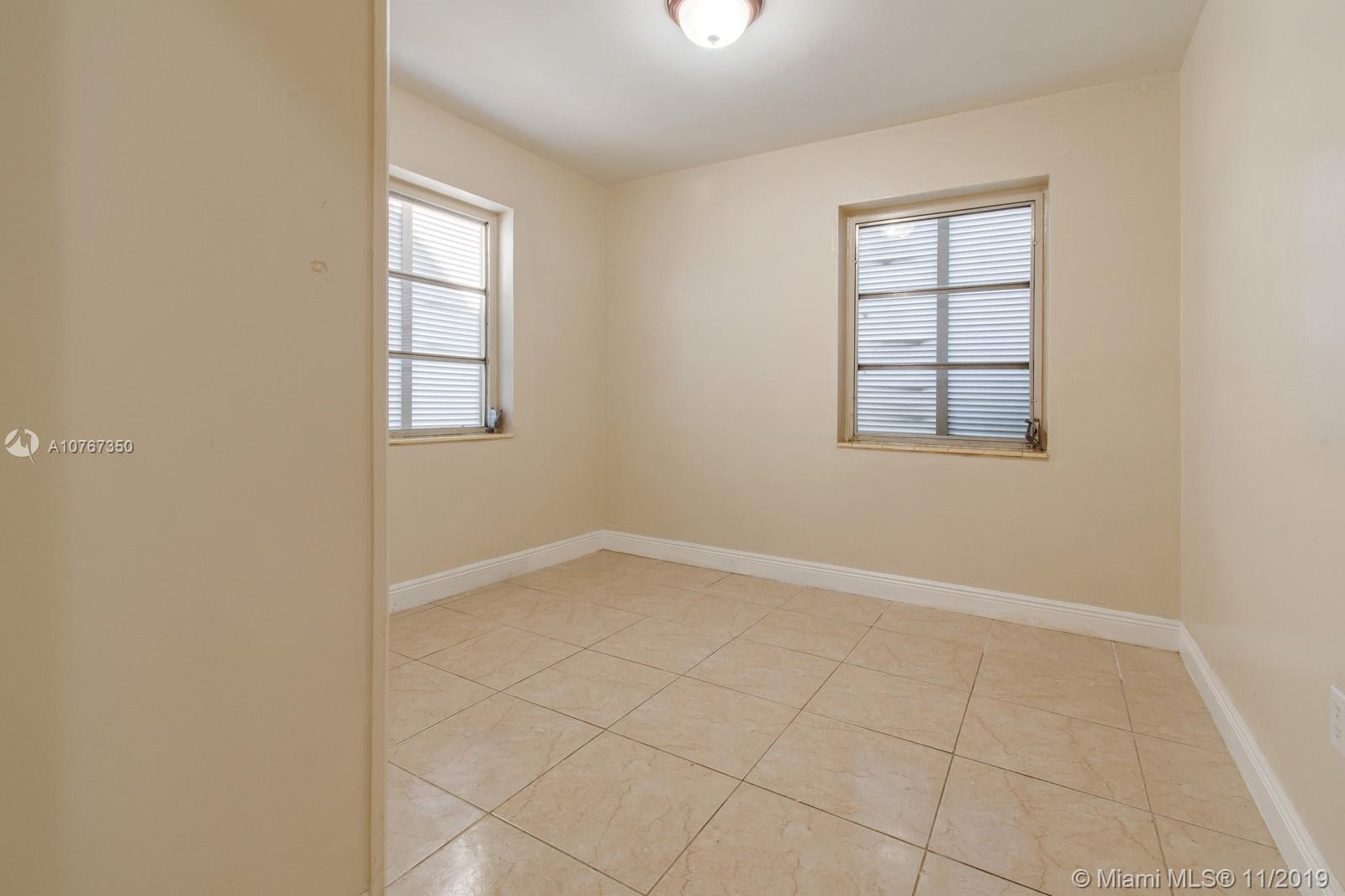 540 Northwest 119th Street Miami, FL 33168 - Photo 6 of 10 Front bedroom