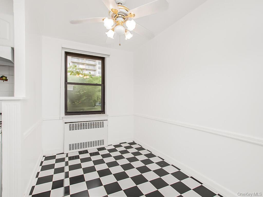 512 Kappock Street, Unit 1K Bronx, NY 10463 - Photo 6 of 11 a black and white wall with a black white and white checkered floor