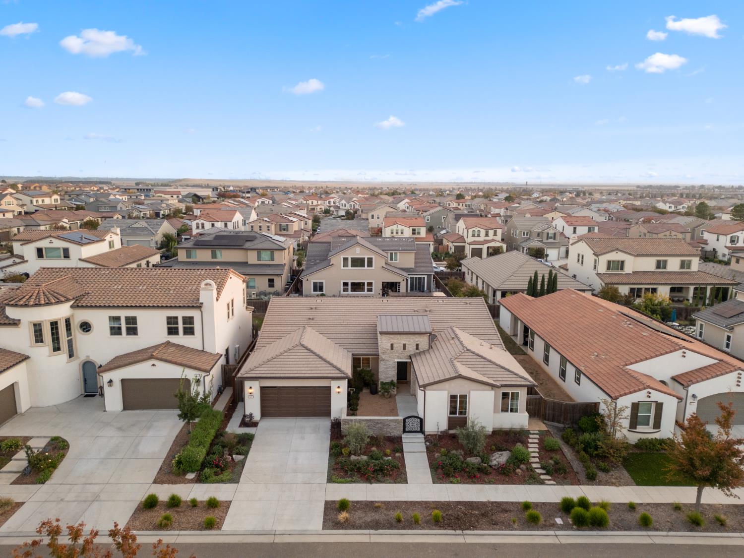 822 Overstone Avenue Madera, CA 93636 - Photo 11 of 49 an aerial view of residential houses with city view